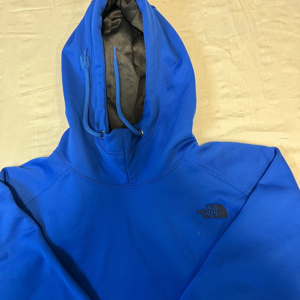 Blue North Face Sweatshirt.